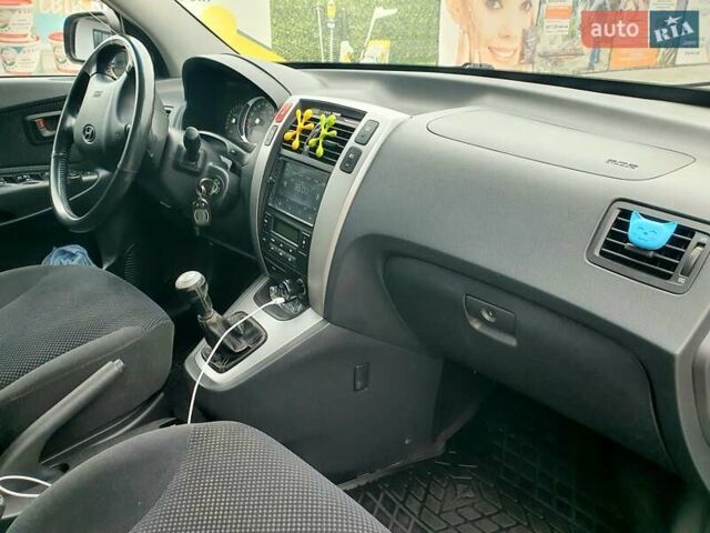 Чорний Хендай Туксон, об'ємом двигуна 2 л та пробігом 225 тис. км за 8000 $, фото 35 на Automoto.ua