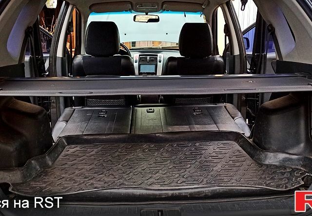 Чорний Хендай Туксон, об'ємом двигуна 2 л та пробігом 188 тис. км за 8800 $, фото 12 на Automoto.ua