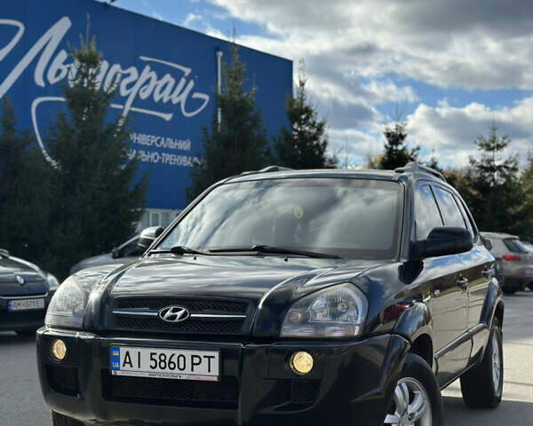 Черный Хендай Туксон, объемом двигателя 2 л и пробегом 300 тыс. км за 8300 $, фото 2 на Automoto.ua