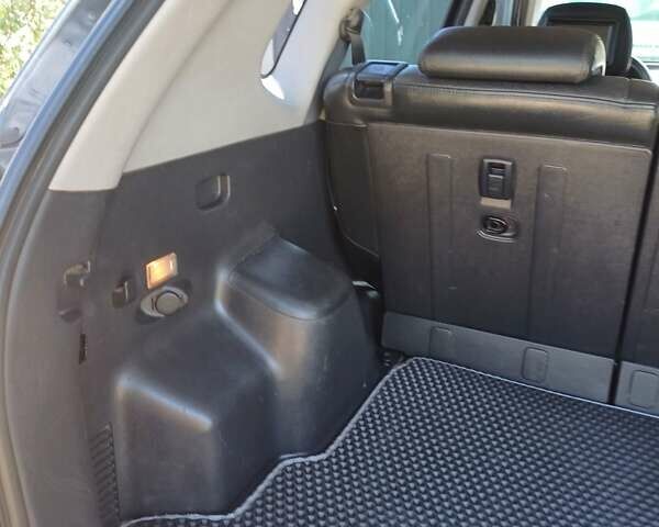 Черный Хендай Туксон, объемом двигателя 1.98 л и пробегом 189 тыс. км за 7800 $, фото 7 на Automoto.ua