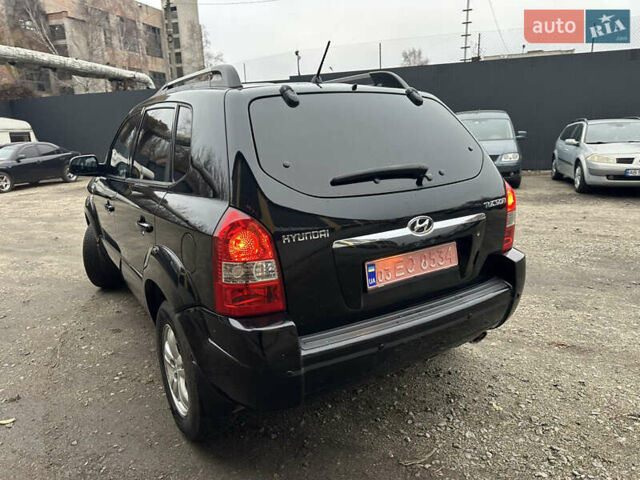 Чорний Хендай Туксон, об'ємом двигуна 2 л та пробігом 243 тис. км за 7999 $, фото 13 на Automoto.ua