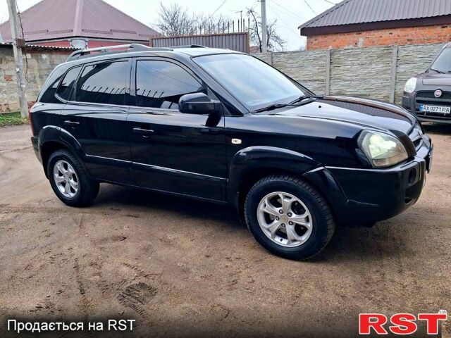 Чорний Хендай Туксон, об'ємом двигуна 2 л та пробігом 208 тис. км за 7500 $, фото 12 на Automoto.ua