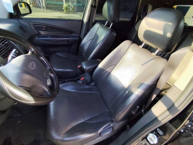 Черный Хендай Туксон, объемом двигателя 2 л и пробегом 82 тыс. км за 7490 $, фото 17 на Automoto.ua