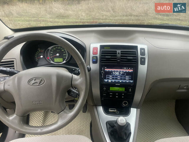 Хендай Туксон 2008 у Лубнах на Automoto.ua Чорний Хендай Туксон, об'ємом двигуна 1.98 л та пробігом 235 тис. км за 6999 $, фото 7 на Automoto.ua