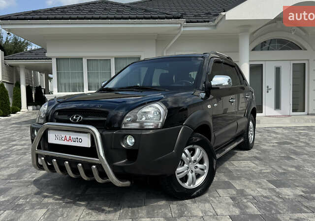 Черный Хендай Туксон, объемом двигателя 2 л и пробегом 67 тыс. км за 9999 $, фото 51 на Automoto.ua