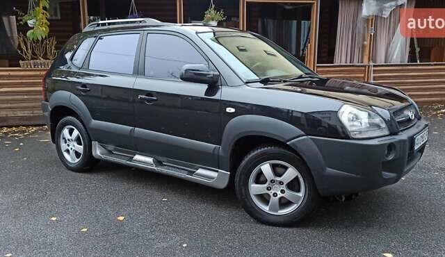 Хендай Туксон 2008 у Харкові на Automoto.ua Чорний Хендай Туксон, об'ємом двигуна 1.99 л та пробігом 188 тис. км за 8800 $, фото 9 на Automoto.ua