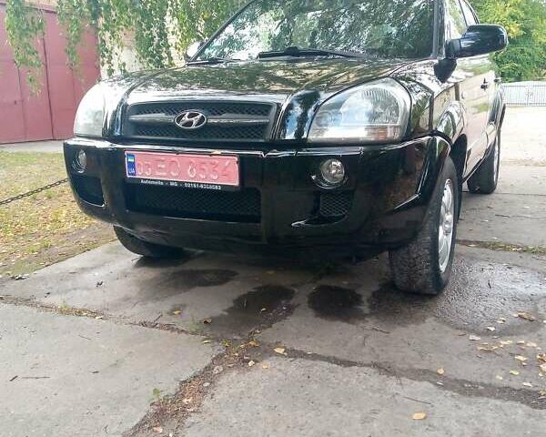 Черный Хендай Туксон, объемом двигателя 2 л и пробегом 224 тыс. км за 7900 $, фото 5 на Automoto.ua