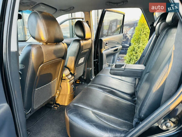 Чорний Хендай Туксон, об'ємом двигуна 2 л та пробігом 186 тис. км за 8300 $, фото 15 на Automoto.ua