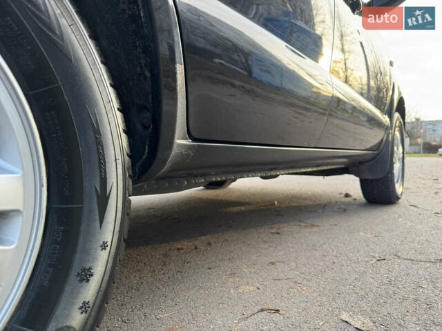 Черный Хендай Туксон, объемом двигателя 1.98 л и пробегом 196 тыс. км за 7999 $, фото 21 на Automoto.ua