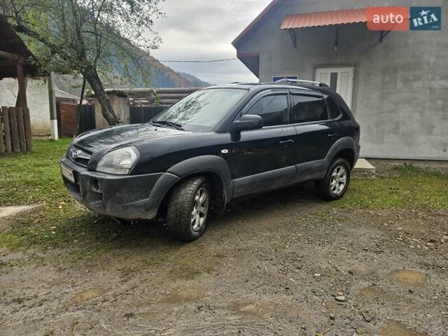 Черный Хендай Туксон, объемом двигателя 1.98 л и пробегом 220 тыс. км за 8300 $, фото 1 на Automoto.ua
