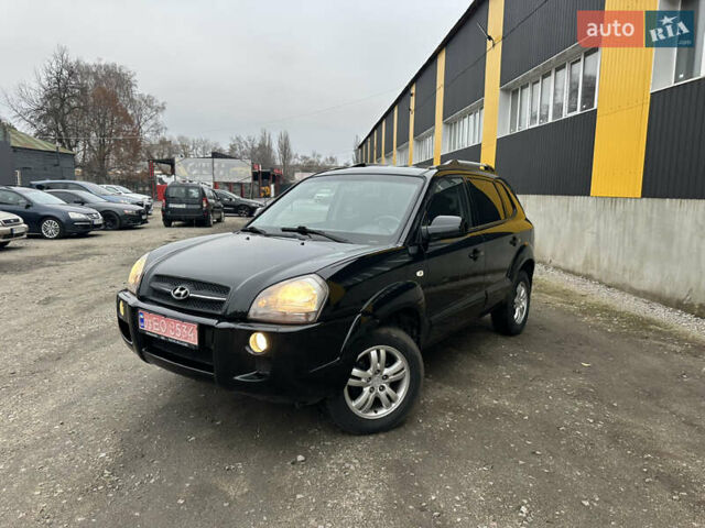 Чорний Хендай Туксон, об'ємом двигуна 2 л та пробігом 243 тис. км за 7999 $, фото 2 на Automoto.ua