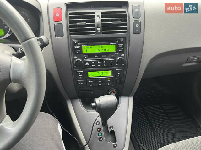 Черный Хендай Туксон, объемом двигателя 2 л и пробегом 107 тыс. км за 8900 $, фото 36 на Automoto.ua