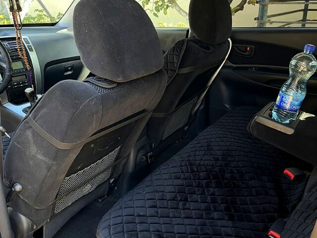 Черный Хендай Туксон, объемом двигателя 2 л и пробегом 151 тыс. км за 9000 $, фото 4 на Automoto.ua