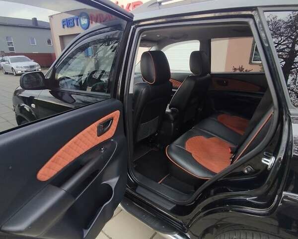 Черный Хендай Туксон, объемом двигателя 1.98 л и пробегом 214 тыс. км за 7700 $, фото 14 на Automoto.ua