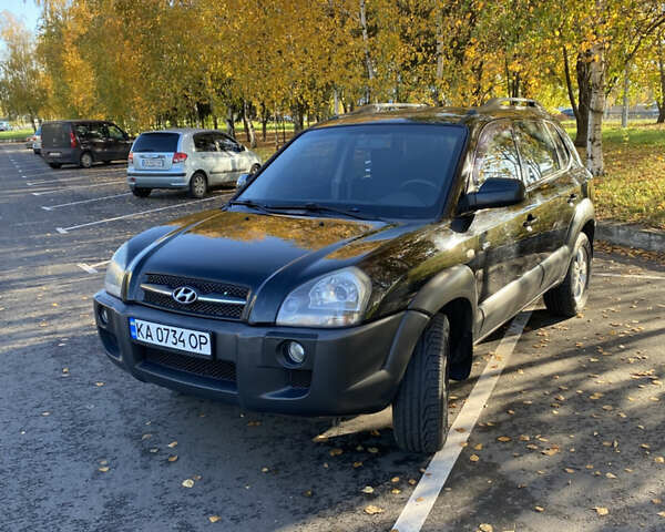 Черный Хендай Туксон, объемом двигателя 1.98 л и пробегом 218 тыс. км за 7200 $, фото 29 на Automoto.ua