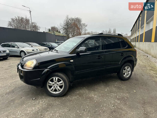 Чорний Хендай Туксон, об'ємом двигуна 2 л та пробігом 243 тис. км за 7999 $, фото 6 на Automoto.ua