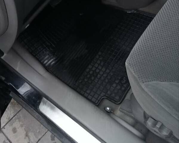 Хендай Туксон 2008 у Вінниці на Automoto.ua Чорний Хендай Туксон, об'ємом двигуна 1.98 л та пробігом 175 тис. км за 8800 $, фото 26 на Automoto.ua