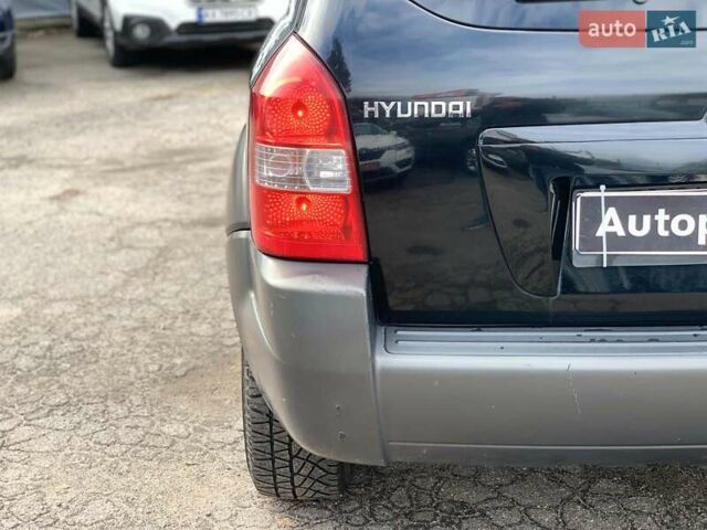 Черный Хендай Туксон, объемом двигателя 2 л и пробегом 117 тыс. км за 7990 $, фото 12 на Automoto.ua