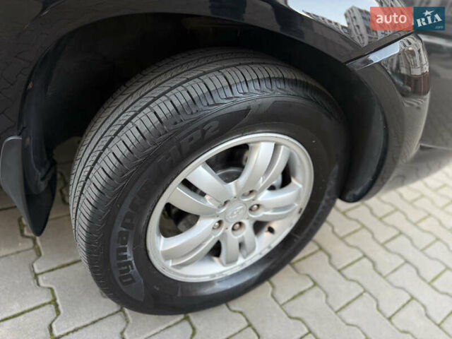 Чорний Хендай Туксон, об'ємом двигуна 2 л та пробігом 156 тис. км за 7850 $, фото 41 на Automoto.ua
