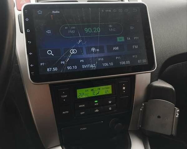 Черный Хендай Туксон, объемом двигателя 1.98 л и пробегом 214 тыс. км за 7700 $, фото 27 на Automoto.ua