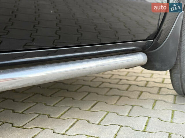 Чорний Хендай Туксон, об'ємом двигуна 2 л та пробігом 156 тис. км за 7850 $, фото 56 на Automoto.ua