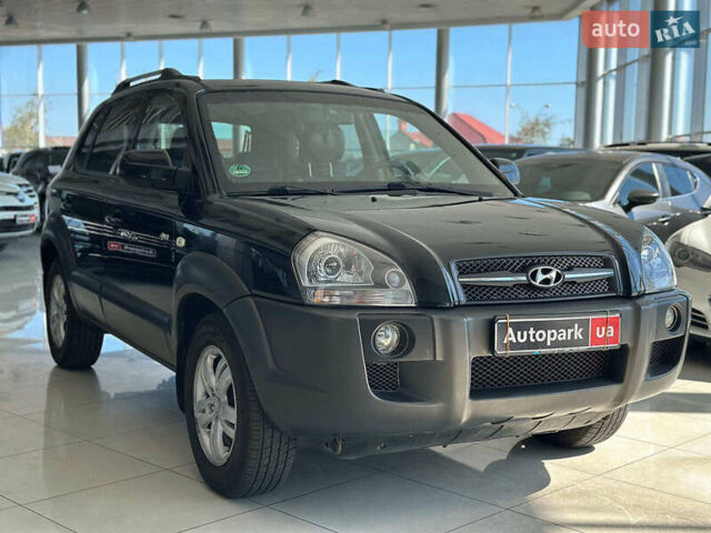 Черный Хендай Туксон, объемом двигателя 2.7 л и пробегом 158 тыс. км за 7940 $, фото 1 на Automoto.ua