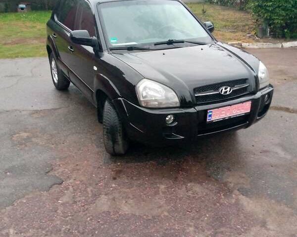 Чорний Хендай Туксон, об'ємом двигуна 2 л та пробігом 225 тис. км за 7850 $, фото 14 на Automoto.ua