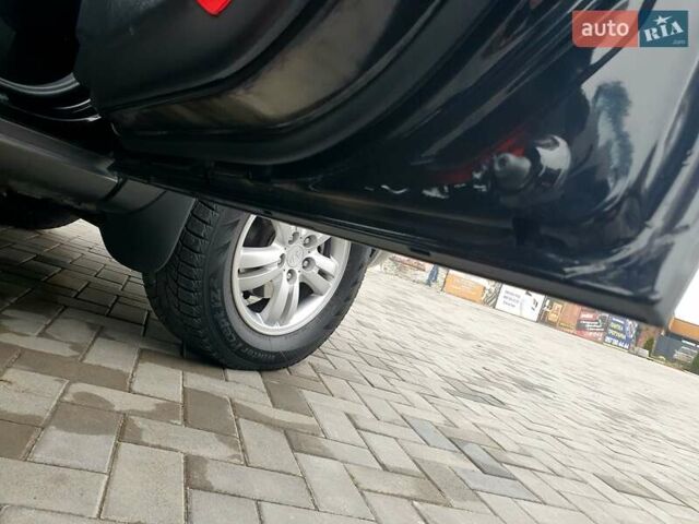 Чорний Хендай Туксон, об'ємом двигуна 2 л та пробігом 225 тис. км за 8000 $, фото 52 на Automoto.ua
