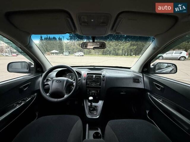 Черный Хендай Туксон, объемом двигателя 1.99 л и пробегом 240 тыс. км за 7200 $, фото 54 на Automoto.ua