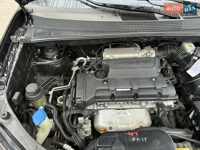 Черный Хендай Туксон, объемом двигателя 2 л и пробегом 136 тыс. км за 8500 $, фото 37 на Automoto.ua