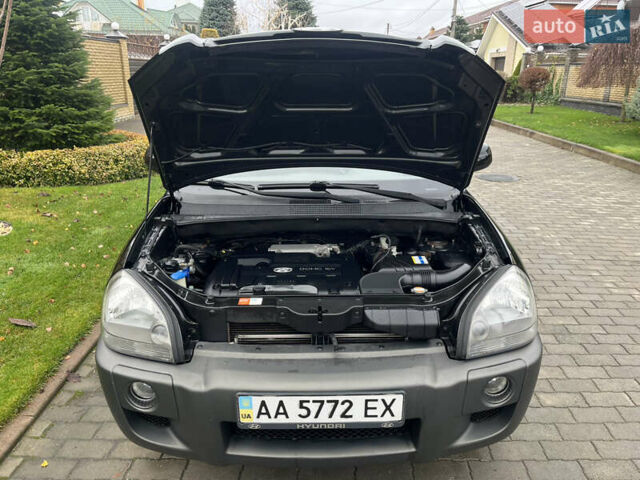 Черный Хендай Туксон, объемом двигателя 2 л и пробегом 107 тыс. км за 8900 $, фото 15 на Automoto.ua