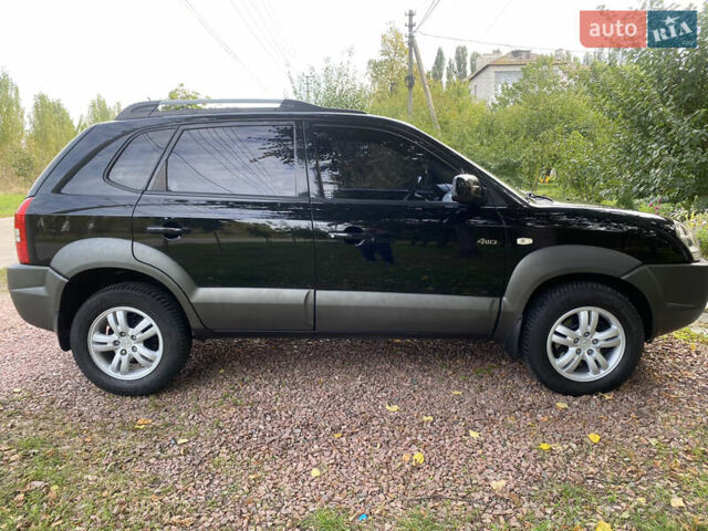 Чорний Хендай Туксон, об'ємом двигуна 2 л та пробігом 160 тис. км за 8800 $, фото 2 на Automoto.ua