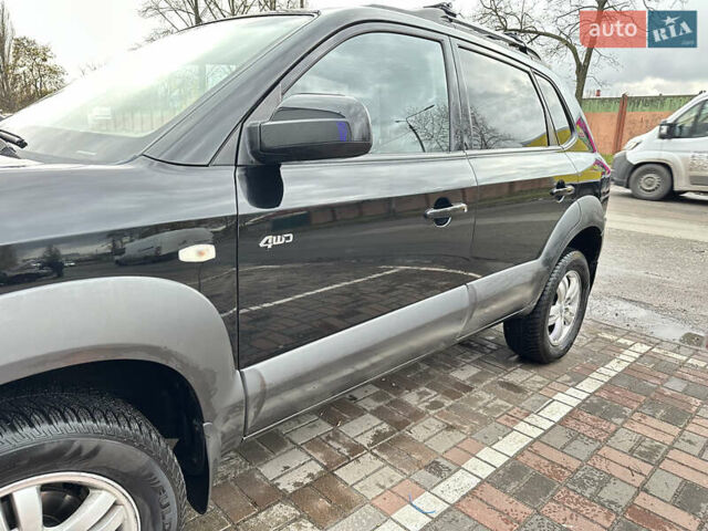 Чорний Хендай Туксон, об'ємом двигуна 2.66 л та пробігом 395 тис. км за 9950 $, фото 4 на Automoto.ua