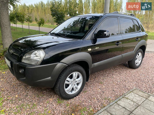 Чорний Хендай Туксон, об'ємом двигуна 2 л та пробігом 160 тис. км за 8800 $, фото 3 на Automoto.ua