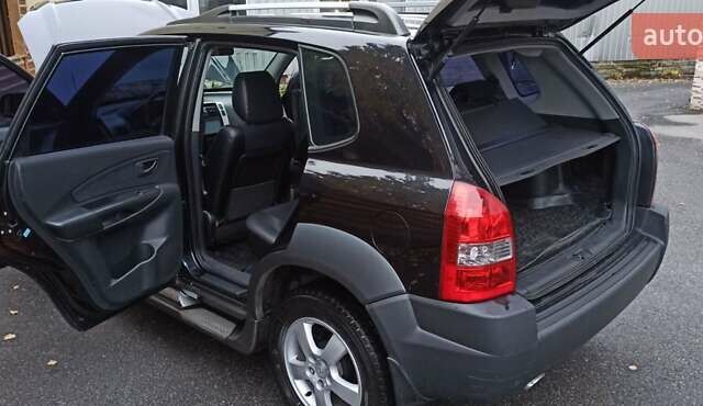 Хендай Туксон 2008 у Харкові на Automoto.ua Чорний Хендай Туксон, об'ємом двигуна 1.99 л та пробігом 188 тис. км за 8800 $, фото 13 на Automoto.ua
