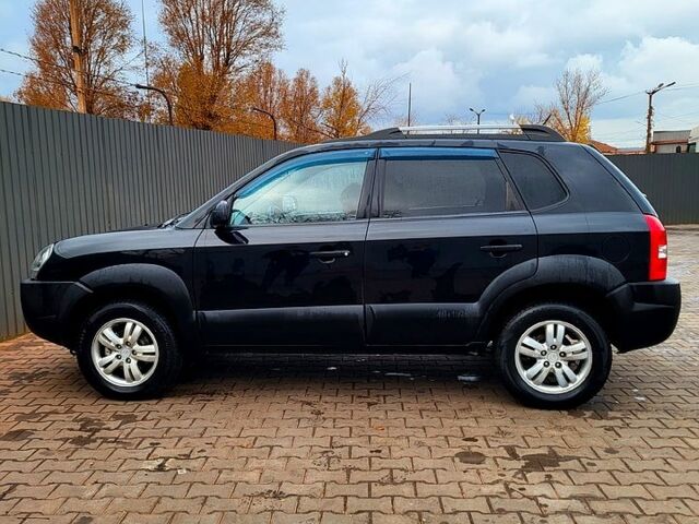 Черный Хендай Туксон, объемом двигателя 2 л и пробегом 223 тыс. км за 7500 $, фото 12 на Automoto.ua