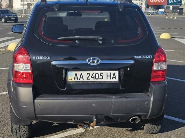 Чорний Хендай Туксон, об'ємом двигуна 1.98 л та пробігом 212 тис. км за 7766 $, фото 3 на Automoto.ua