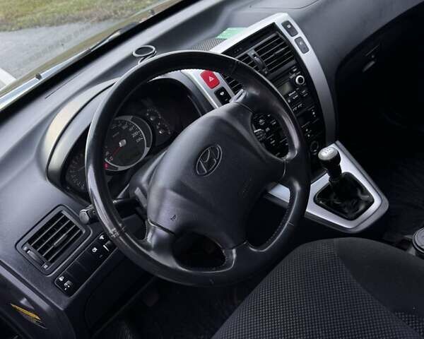 Черный Хендай Туксон, объемом двигателя 2 л и пробегом 253 тыс. км за 8299 $, фото 8 на Automoto.ua