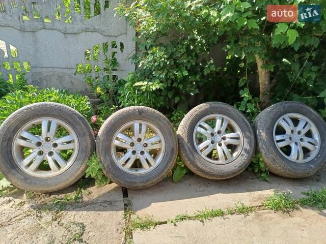 Черный Хендай Туксон, объемом двигателя 1.98 л и пробегом 189 тыс. км за 7800 $, фото 22 на Automoto.ua