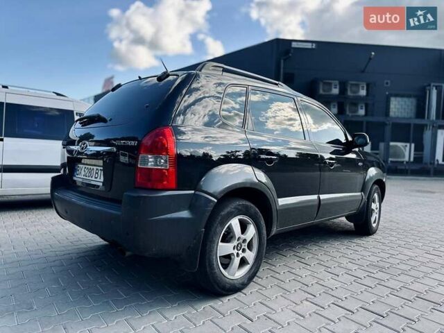 Черный Хендай Туксон, объемом двигателя 1.98 л и пробегом 206 тыс. км за 8300 $, фото 15 на Automoto.ua