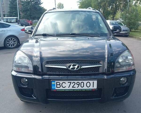 Черный Хендай Туксон, объемом двигателя 1.98 л и пробегом 195 тыс. км за 6981 $, фото 4 на Automoto.ua