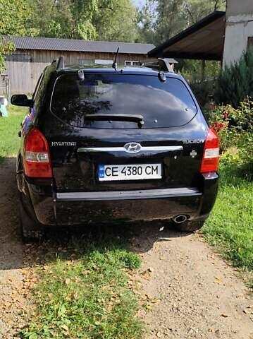 Чорний Хендай Туксон, об'ємом двигуна 1.98 л та пробігом 224 тис. км за 8000 $, фото 4 на Automoto.ua