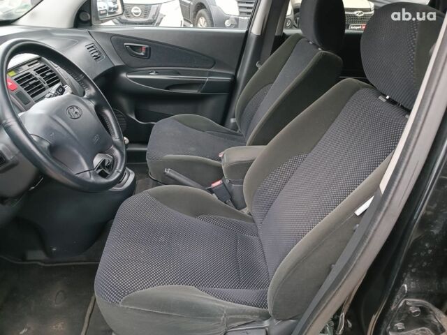 Чорний Хендай Туксон, об'ємом двигуна 2 л та пробігом 192 тис. км за 7990 $, фото 19 на Automoto.ua