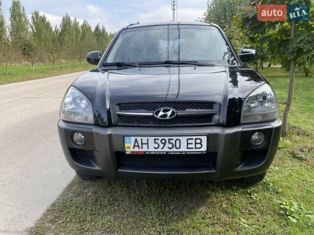 Чорний Хендай Туксон, об'ємом двигуна 2 л та пробігом 160 тис. км за 8800 $, фото 1 на Automoto.ua