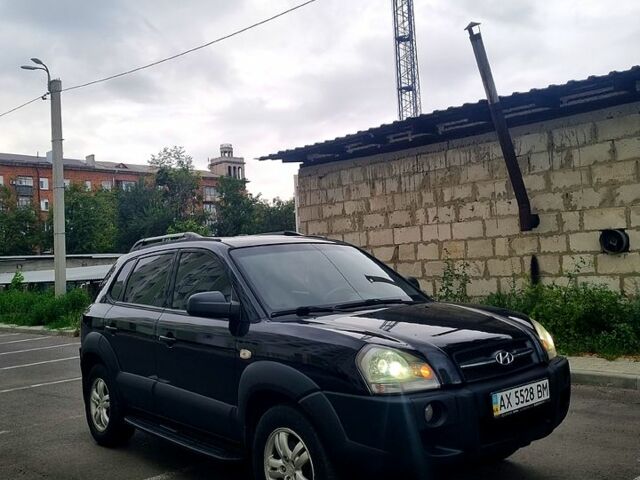 Черный Хендай Туксон, объемом двигателя 2 л и пробегом 152 тыс. км за 7800 $, фото 2 на Automoto.ua