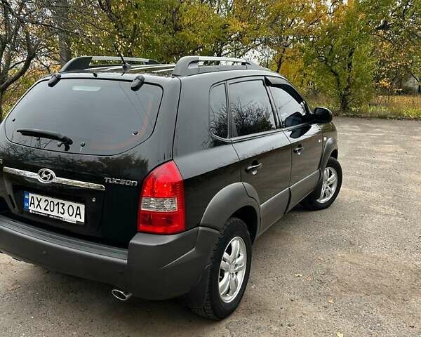 Хендай Туксон 2008 в Богодухове на Automoto.ua Черный Хендай Туксон, объемом двигателя 1.98 л и пробегом 268 тыс. км за 8500 $, фото 3 на Automoto.ua