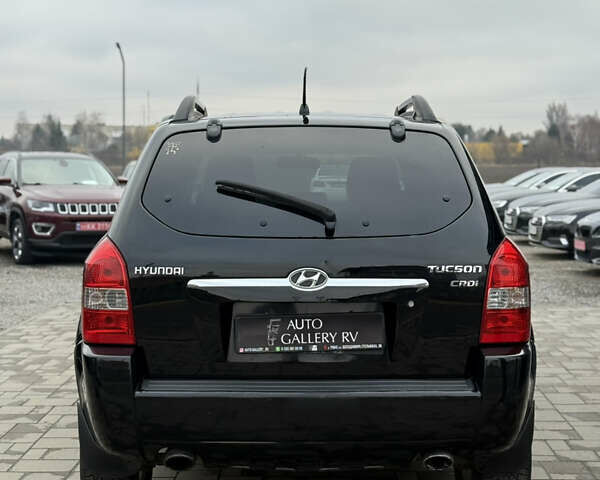 Чорний Хендай Туксон, об'ємом двигуна 2 л та пробігом 240 тис. км за 6888 $, фото 9 на Automoto.ua