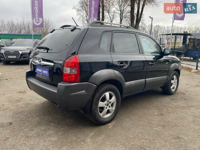 Чорний Хендай Туксон, об'ємом двигуна 1.98 л та пробігом 176 тис. км за 8500 $, фото 6 на Automoto.ua