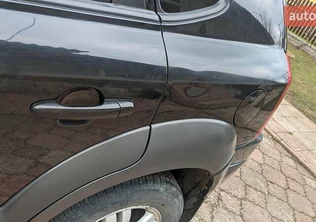 Черный Хендай Туксон, объемом двигателя 2 л и пробегом 163 тыс. км за 8100 $, фото 33 на Automoto.ua