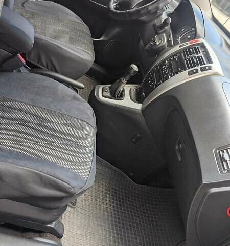 Черный Хендай Туксон, объемом двигателя 2 л и пробегом 163 тыс. км за 8100 $, фото 20 на Automoto.ua